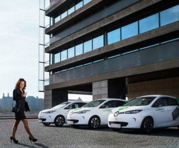Press material of Business woman is using GreenMobility